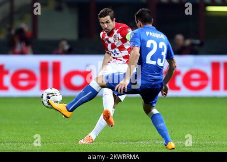 Croatia's Danijel Pranjic (left) and Italy's Manuel Pasqual in action during the European Championship, qualifying round, group H match between Italy and Croatia in San Siro Stadium, Milan on 15th November 2014. Photo: Goran Stanzl/PIXSELL Stock Photo