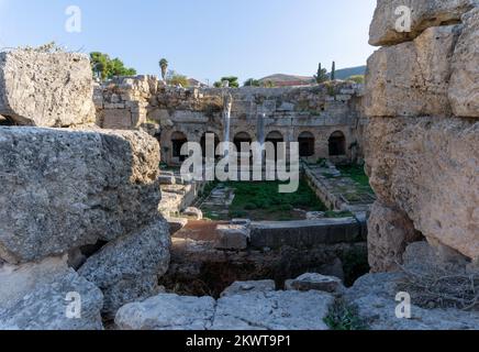 Corinth, Greece - 8 November, 2022: view of the Pirene Fountain ruins in Ancient Corinth in Southern Greece Stock Photo