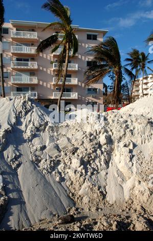 Hurricane Wilma,  Key West, FL, November 4, 2005   Mounds of sand are piled up in the middle of the street by city workers. The sand covered the street as a result of Hurricane Wilma.. Photographs Relating to Disasters and Emergency Management Programs, Activities, and Officials Stock Photo
