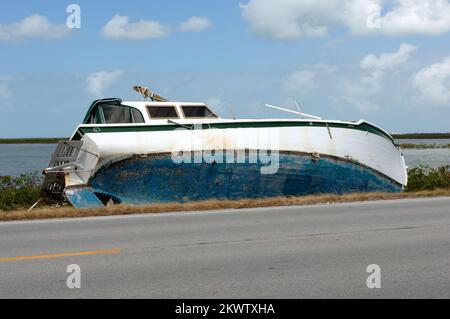 Hurricane Wilma,  Key West, FL, November 5, 2005   A boat remains lodged on the side of Route 1 as a result of Hurricane Wilma.. Photographs Relating to Disasters and Emergency Management Programs, Activities, and Officials Stock Photo