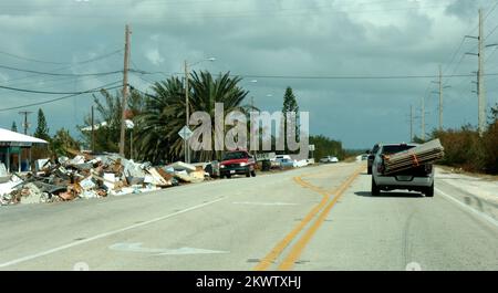 Hurricane Wilma,  Key West, FL, November 5, 2005   Piles of debris line the side of Route 1 as a result of Hurricane Wilma as residents continue to transport materials to repair damage.. Photographs Relating to Disasters and Emergency Management Programs, Activities, and Officials Stock Photo