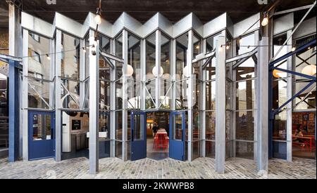 Concertina facade of Camden Town Beer Hall. Camden Town Beer Hall, London, United Kingdom. Architect: Gundry & Ducker, 2021. Stock Photo