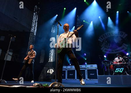 29.07.2016., Pula, Croatia - Status Quo held concert at the spectacular Pula Arena. Status Quo is one of the most long-lasting UK rock bands of all time, and sold 118 million records worldwide since their first single. The group have had over 60 chart hits in the UK, with 22 them reaching the Top 10. In 1991, Status Quo received a Brit Award for Outstanding Contribution to Music.     Stock Photo