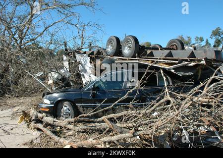 Severe Storms and Tornadoes,  Lady Lake, Fla., February 6, 2007   The recent tornadoes took this manufactured home into the air and put it on this car. Tornadoes are very powerful and destructive forces. Mark Wolfe/FEMA.. Photographs Relating to Disasters and Emergency Management Programs, Activities, and Officials Stock Photo