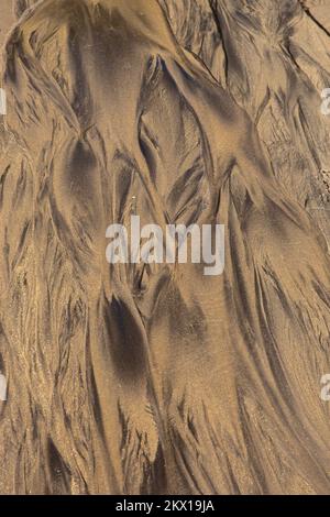 Fine beach sand in the summer sun. Sand texture. Sandy beach for background. Top view. Natural sandstone texture background Stock Photo