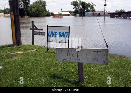 Severe Storms, Tornadoes, and Flooding,  Columbus Junction, IA, June 16, 2008   The flooded section of lower Columbus Junction now has sign that names a newly created lake, thanks to an anonymous resident. The high water from the rain-swelled Iowa and Cedar rivers broke through the town's levee on Saturday night.. Photographs Relating to Disasters and Emergency Management Programs, Activities, and Officials Stock Photo