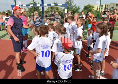 24.07.2017., Petrcane, Croatia - Former German football star Lothar Matthaus during his vocation organized a small football school for children and teenagers, where he gave the kids a cue. Photo: Dino Stanin/PIXSELL  Stock Photo