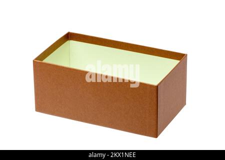 Empty opened brown cardboard box or kraft paper box with clipping path isolated on white background. Suitable for packaging. Macro. Stock Photo