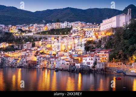 Scilla, Italy waterfront buildings at the port at dusk. Stock Photo