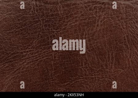 Brown leather background. Texture of genuine leather Stock Photo