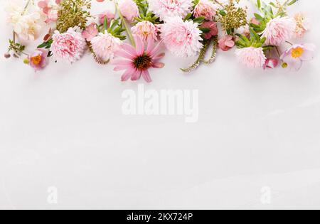 Autumn creative composition asters, hydrangea flowers on gray background. Fall, autumn background. Stock Photo