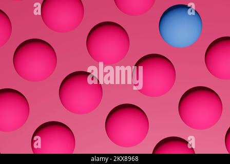 Top view of pink 3d render pattern balls with one blue sphere on isolated pink background.Gender equality concept in pink and blue. Stock Photo