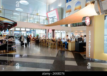 DUBAI, UAE - MARCH 10, 2015: DXB airport interior. Dubai International Airport is the primary airport serving Dubai, United Arab Emirates, and is the Stock Photo