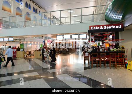 DUBAI, UAE - MARCH 10, 2015: DXB airport interior. Dubai International Airport is the primary airport serving Dubai, United Arab Emirates, and is the Stock Photo