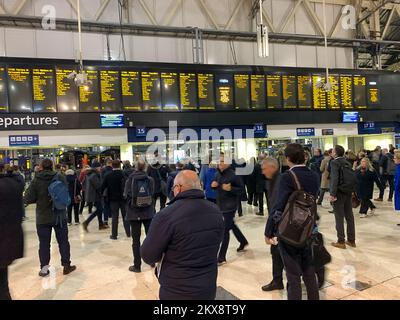 London, UK. 29th November, 2022. Commuters waiting for their trains home at Waterloo Station. Another National Rail Strike is planned for 13th, 14th, 16th and 17th December due to an ongoing dispute over pay and planned ticket office closures. Credit: Maureen McLean/Alamy Stock Photo