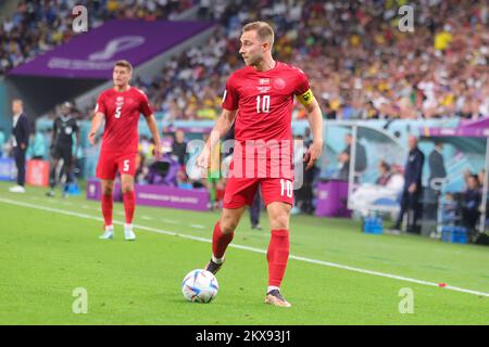 Al Wakrah, Qatar. 30th Nov, 2022. Christian Eriksen of Denmark dribbles the ball during the FIFA World Cup Qatar 2022 Group D match between Australia and Denmark at Al Janoub Stadium, Al Wakrah, Qatar on 30 November 2022. Photo by Peter Dovgan. Editorial use only, license required for commercial use. No use in betting, games or a single club/league/player publications. Credit: UK Sports Pics Ltd/Alamy Live News Stock Photo