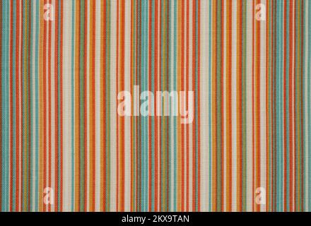 Multi colored fabric placemat, with vertical lines, Abstract close up backdrop Stock Photo
