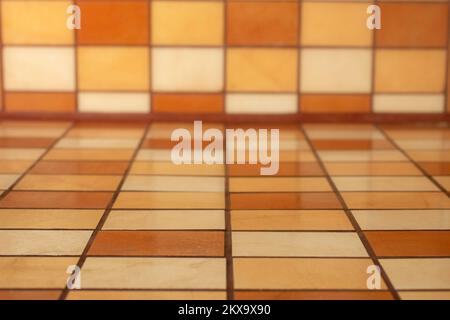 Rectangular ceramic tiles counter and backsplash mockup, soft focus perspective close up, empty design for product placement Stock Photo