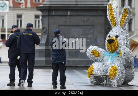 01.04.2018., Croatia, Zagreb - Festive decorations, rabbits, chickens, basket with eggs, refresh the appearance of the main square and the tourists, passers-by, but also the traffic guards, photographed with them. Photo: Marko Lukunic/PIXSELL  Stock Photo