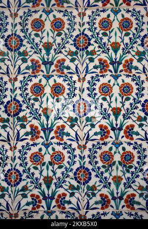 Seamless pattern white Turkish tiles with blue ornaments. Old surface texture, wall in mosque Stock Photo