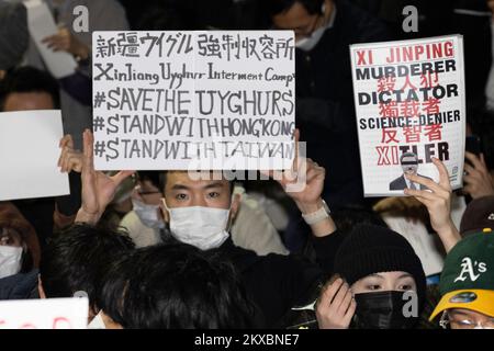 Tokyo, Japan. 30th Nov, 2022. Tokyoites, Hong Kongers, Taiwanese, Uyghurs and Chinese dissidents protest outside Shinjuku Station against President Xi Jinping and the governing Chinese Communist Party's (CCP) draconian Zero-COVID policy. (Credit Image: © Taidgh Barron/ZUMA Press Wire) Stock Photo