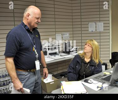 Flooding   Severe Storm - Dyersburg, Tenn. , May 18, 2011   FEMA Safety Officer, Donald Olsen, discusses his checklist with Disaster Recovery Center Manager, Bea Riddle. One of the Safety Officer's job is to insure that all facilities are safe for both staff and visitors. Marilee Caliendo/FEMA. Tennessee Severe Storms, Tornadoes, Straight-line Winds, and Flooding. Photographs Relating to Disasters and Emergency Management Programs, Activities, and Officials Stock Photo