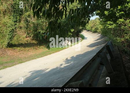 The famous historic inclined curve at the old racing circuit at Monza near Milano. Stock Photo