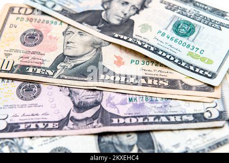 Close up of a one, five, ten and twenty US dollar bills. Stock Photo