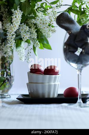 Easter eggs in small bowls. Stock Photo