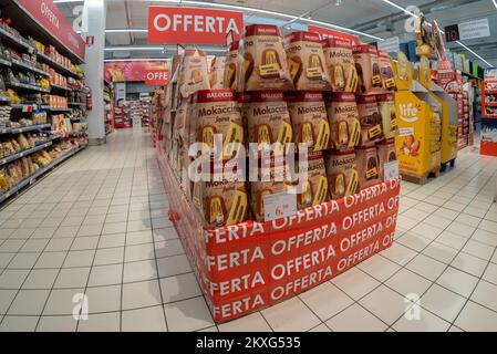 Bra, Cuneo, Italy - November 30, 2022: packs of Balocco brand pandoro filled with Segafredo brand mokaccino cream displayed in the offer pallet in an Stock Photo