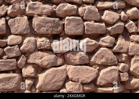 Old brown stone wall at south america Stock Photo