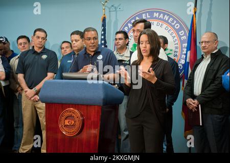 Hurricane/Tropical Storm - San Juan, Puerto Rico, August 24, 2011   Justo Hernandez, federal coordinating officer, briefs the media regarding FEMA's support of local officials after Hurricane Irene. Preliminary damage assessments are planned for the affected areas, to find out if additional federal assistance is required.. Puerto Rico Hurricane Irene. Photographs Relating to Disasters and Emergency Management Programs, Activities, and Officials Stock Photo