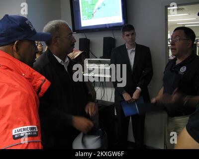 Flooding   Hurricane/Tropical Storm - Philadelphia, Pa. , PA, August 27, 2011   Congressman Chaka Fattah & Philadelphia Mayor Michael Nutter receive a briefing from RRCC Director Steve Ward prior to the onset of hurricane Irene... Photographs Relating to Disasters and Emergency Management Programs, Activities, and Officials Stock Photo