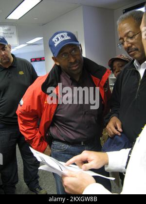 Flooding   Hurricane/Tropical Storm - Philadelphia, Pa. , August 27, 2011   Congressman Chaka Fattah & Philadelphia Mayor Michael Nutter receive a briefing from National Weather Service Liaison Fred McMullen prior to the onset of hurricane Irene... Photographs Relating to Disasters and Emergency Management Programs, Activities, and Officials Stock Photo