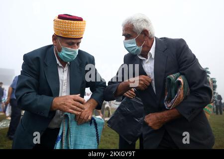 Bosnian Muslims offer Eid al-Adha prayers on the stadium during the outbreak of the coronavirus disease (COVID-19) in village of Zupca, Bosnia and Herzegovina, on July 31, 2020. Photo: Armin Durgut/PIXSELL  Stock Photo