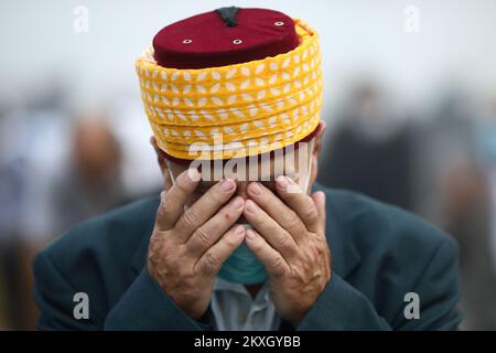 Bosnian Muslims offer Eid al-Adha prayers on the stadium during the outbreak of the coronavirus disease (COVID-19) in village of Zupca, Bosnia and Herzegovina, on July 31, 2020. Photo: Armin Durgut/PIXSELL  Stock Photo