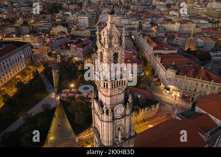 Aerial view of the 18th-century Clerigos Tower (Portuguese: Torre dos Clerigos) at dusk in Porto (Oporto), Portugal. Stock Photo