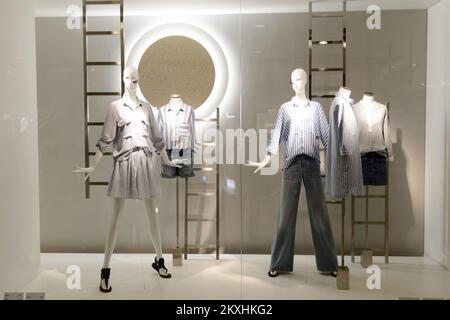 HONG KONG - MAY 05, 2015: Zara store interior. Zara is a Spanish clothing and accessories retailer based in Arteixo, Galicia, and founded in 1975 by A Stock Photo