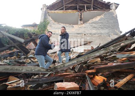 Dean Jadanic proposed to his girlfriend Ana Krznarevic in the ruins, at the place where he almost lost his life, in front of the Health Center in Petrinja, Croatia on January 9, 2021. They met four years ago at the store, where she worked, on her birthday. They started a relationship a few months later and have been inseparable ever since. Dean has been working as a medical technician at the Petrinja Health Center for thirteen years, and after the last earthquake on December 29, he barely pulled his head out. Now they both volunteer to help the victims of the earthquake, so they rarely see ea Stock Photo