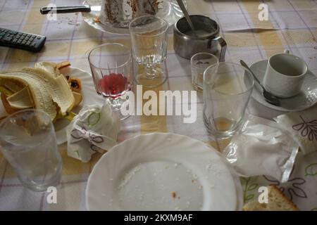 table is a mess after having lunch and having coffee Stock Photo