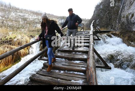 The pictures show people enjoying the Plitvice Lakes National Park covered with new snow., Plitvice Lakes National Park is one of the oldest and largest national parks inÂ Croatia. Plitvice Lakes National Park was added to theÂ UNESCO World HeritageÂ register., in Plitvice, Croatia, on March 15, 2021. Photo: Kristina Stedul FabacPIXSELL Stock Photo