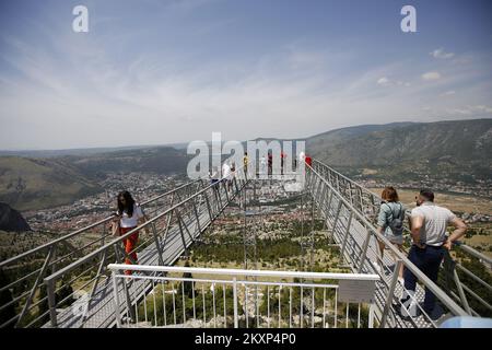 A new attraction of the Fortica adventure park, which gathers more and more domestic and foreign tourists every day, has recently been a swing made above Mostar. The swing is located 15 meters above the ground and 10 meters long swing is the largest swing in Bosnia and Herzegovina. It is intended for adults and is located under a glass lookout with a view of Mostar, which makes swinging even more interesting., in Mostar, Bosnia and Herzegovina, on June 20, 2021. Photo: Denis Kapetanovic/PIXSELL Stock Photo