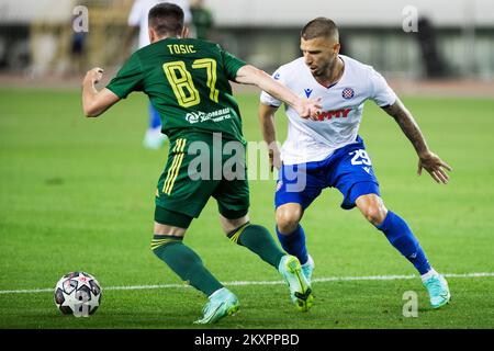 Zagreb, Croatia. 15th July, 2023. Jan Mlakar of Hajduk Split and Fran Topic  of Dinamo Zagreb in action during the Supersport Supercup match between GNK  Dinamo Zagreb and HNK Hajduk Split at