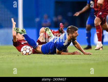 Croatia, Zagreb - AUGUST 4, 2021 Bartosz Slisz, Bruno Petkovic during UEFA Champions League third qualifying round Leg 1 football match between Dinamo Zagreb and Legia Warsaw on Maksimir Stadium. Photo: Josip Regovic/PIXSELL Stock Photo