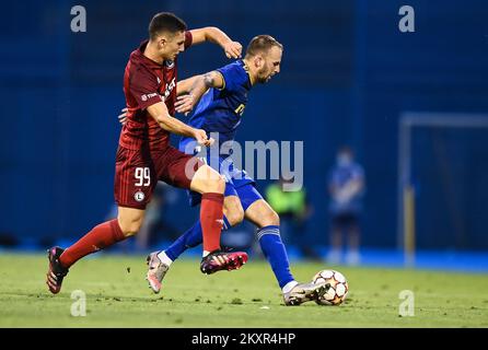 Croatia, Zagreb - AUGUST 4, 2021 Bartosz Slisz, Josip Misic during UEFA Champions League third qualifying round Leg 1 football match between Dinamo Zagreb and Legia Warsaw on Maksimir Stadium. Photo: Josip Regovic/PIXSELL Stock Photo