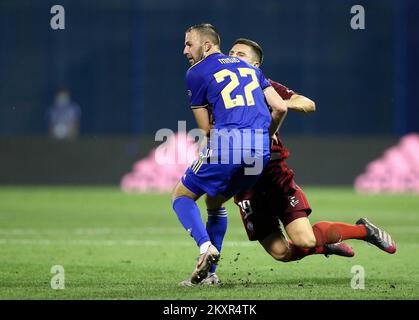 Croatia, Zagreb - AUGUST 4, 2021 Josip Misic, Bartosz Slisz during UEFA Champions League third qualifying round Leg 1 football match between Dinamo Zagreb and Legia Warsaw on Maksimir Stadium. Photo: Matija Habljak/PIXSELL Stock Photo