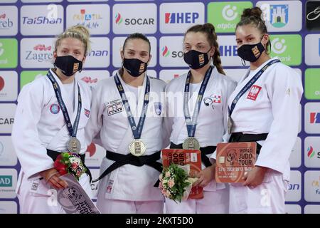 ZAGREB, CROATIA - SEPTEMBER 25: (L-R) Silver medalist Kelly Petersen-Pollard of Great Britain, gold medalist Anka Pogacnik of Slovenia and bronze medalists Alina Lengweiler of Switzerland and Katarzyna Sobierajska of Poland during the Wommen's -70kg medal ceremony on day two of the Judo Grand Prix Zagreb 2021 at Arena Zagreb in Zagreb, Croatia on September 25, 2021. Photo: Igor Kralj/PIXSELL Stock Photo