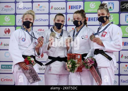 ZAGREB, CROATIA - SEPTEMBER 25: (L-R) Silver medalist Kelly Petersen-Pollard of Great Britain, gold medalist Anka Pogacnik of Slovenia and bronze medalists Alina Lengweiler of Switzerland and Katarzyna Sobierajska of Poland during the Wommen's -70kg medal ceremony on day two of the Judo Grand Prix Zagreb 2021 at Arena Zagreb in Zagreb, Croatia on September 25, 2021. Photo: Igor Kralj/PIXSELL Stock Photo