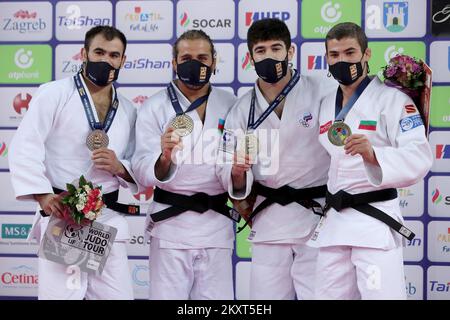 ZAGREB, CROATIA - SEPTEMBER 25: (L-R) Silver medalist Victor Sterpu of Moldova, gold medalist Hidayet Heydarov of Azerbaijan and bronze medalists Makhmadbek Makhmadbekov of Russia and Mark Hristov of Bulgaria during the Men's -73kg medal ceremony on day two of the Judo Grand Prix Zagreb 2021 at Arena Zagreb in Zagreb, Croatia on September 25, 2021. Photo: Igor Kralj/PIXSELL Stock Photo