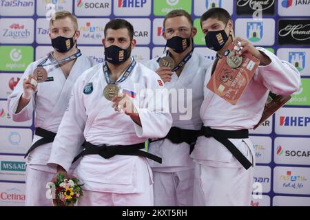ZAGREB, CROATIA - SEPTEMBER 26: (L-R) Silver medalist Dario Kurbjeweit Garcia of Germany, gold medalist Arman Adamian of Russia and bronze medalists Simeon Catharina of Netherlands and Marko Kumric of Croatia during the Men's -100kg medal ceremony on day 3 of the Judo Grand Prix Zagreb 2021 at Arena Zagreb in Zagreb, Croatia on September 26, 2021. Photo: Igor Kralj/PIXSELL Stock Photo